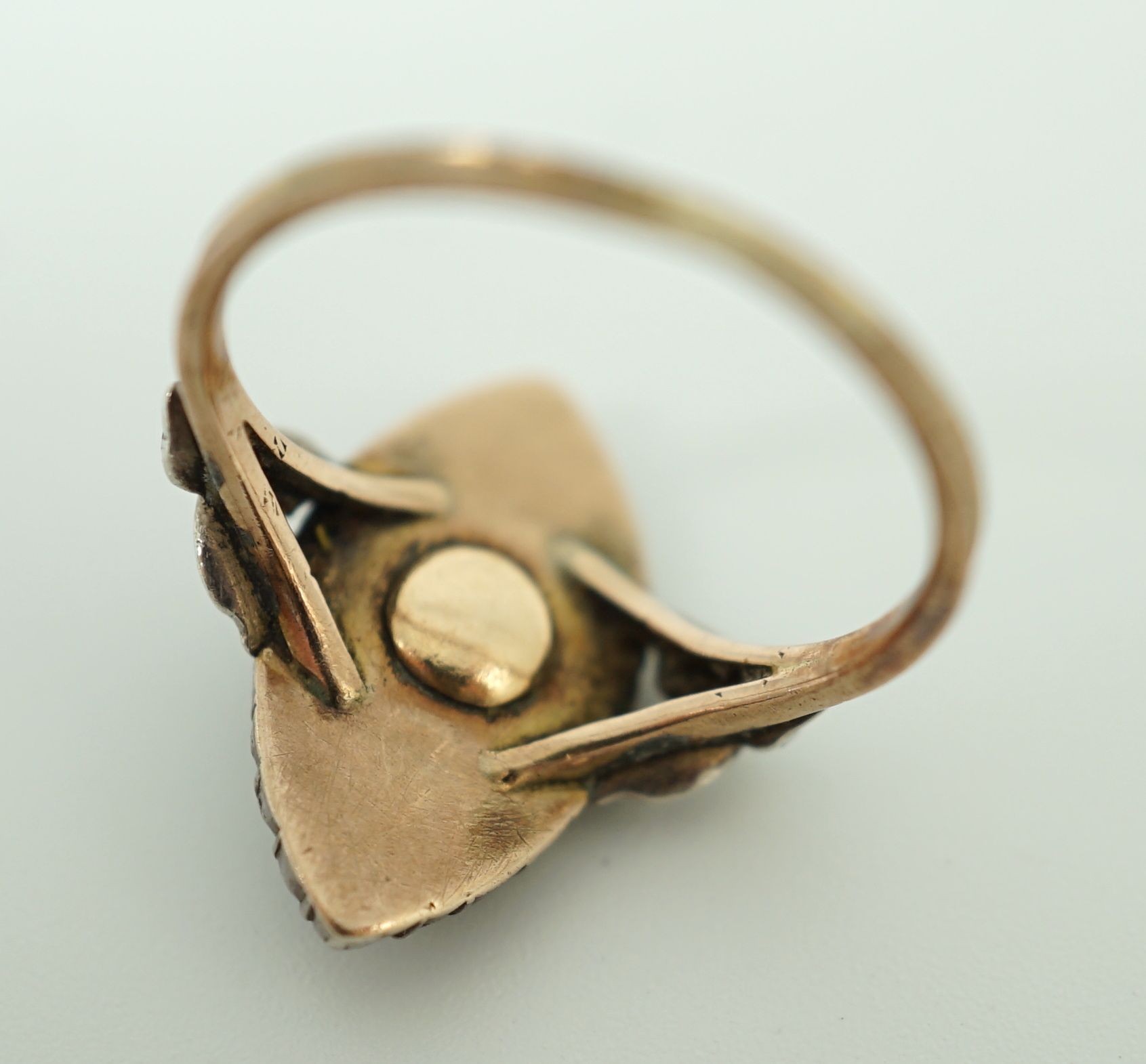 An 19th century gold, rose cut diamond and blue guilloche enamel set marquise shaped ring